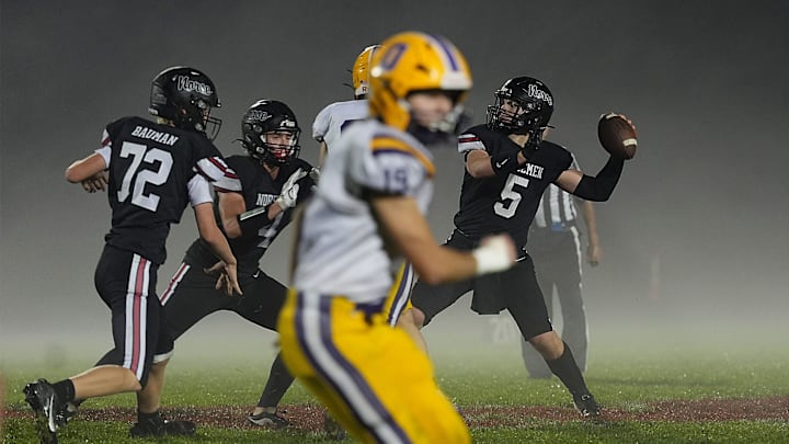 Roland-Story quarterback Tucker Hawkins (5) passes the ball against Oelwein during the fourth quarter in the week 8 Iowa high school football at Norseman Stadium on Oct. 17, 2025, in Story City, Iowa.