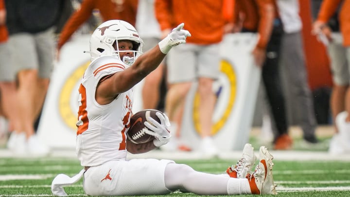 Texas White team wider receiver Ryan Niblett (18) celebrates making a catch for a first down in the second quarter of the Longhorns' spring Orange and White game at Darrell K Royal Texas Memorial Stadium in Austin, Texas, April 20, 2024.