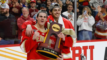 Zeev Buium (left) and his brother Shai after winning the National Championship for Denver. 