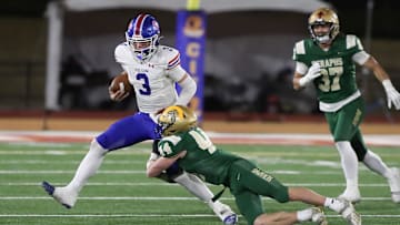 St. Bonaventure's Dylan Dunst tackles Folsom quarterback Ryder Lyons during the fourth quarter of the CIF-State Division 1-A state championship bowl at Saddleback College in Mission Viejo on Saturday, Dec. 9, 2023. St. Bonaventure lost 20-14.