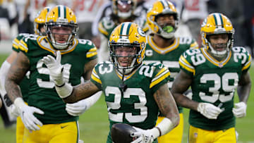 Green Bay Packers cornerback Jaire Alexander celebrates an NFL interception against the Tampa Bay Buccaneers