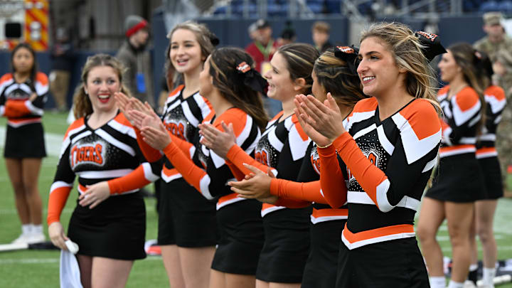 Liberty Center cheerleaders cheer during the 2023 Division V state championship game.