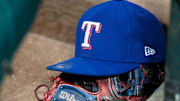 Jun 20, 2017; Arlington, TX, USA; A view of a Texas Rangers baseball hat and Wilson glove during the game between the Texas Rangers and the Toronto Blue Jays at Globe Life Park in Arlington.