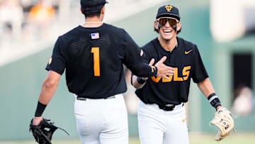 Tennessee's Dean Curley (1) and Tennessee's Manny Marin (4) celebrate a call in Tennessee's favor during a college baseball game between Tennessee and Vanderbilt at Lindsey Nelson Stadium in Knoxville, Tenn., on May 9, 2025.