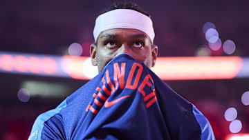 Jan 26, 2025; Portland, Oregon, USA; Oklahoma City Thunder guard Shai Gilgeous-Alexander (2) covers his face during introductions before a game against the Portland Trail Blazers at Moda Center. Mandatory Credit: Troy Wayrynen-Imagn Images