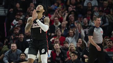 Jan 11, 2025; Portland, Oregon, USA; Portland Trail Blazers guard Anfernee Simons (1) reacts after being fouled and scoring a basket during the second half against the Miami Heat at Moda Center. Mandatory Credit: Troy Wayrynen-Imagn Images