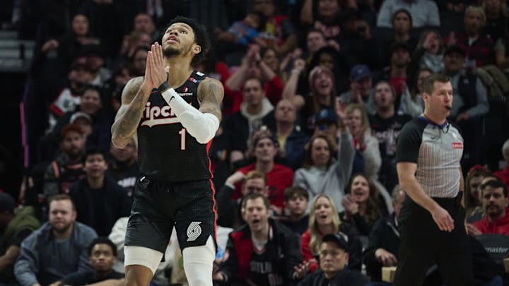 Jan 11, 2025; Portland, Oregon, USA; Portland Trail Blazers guard Anfernee Simons (1) reacts after being fouled and scoring a basket during the second half against the Miami Heat at Moda Center. Mandatory Credit: Troy Wayrynen-Imagn Images