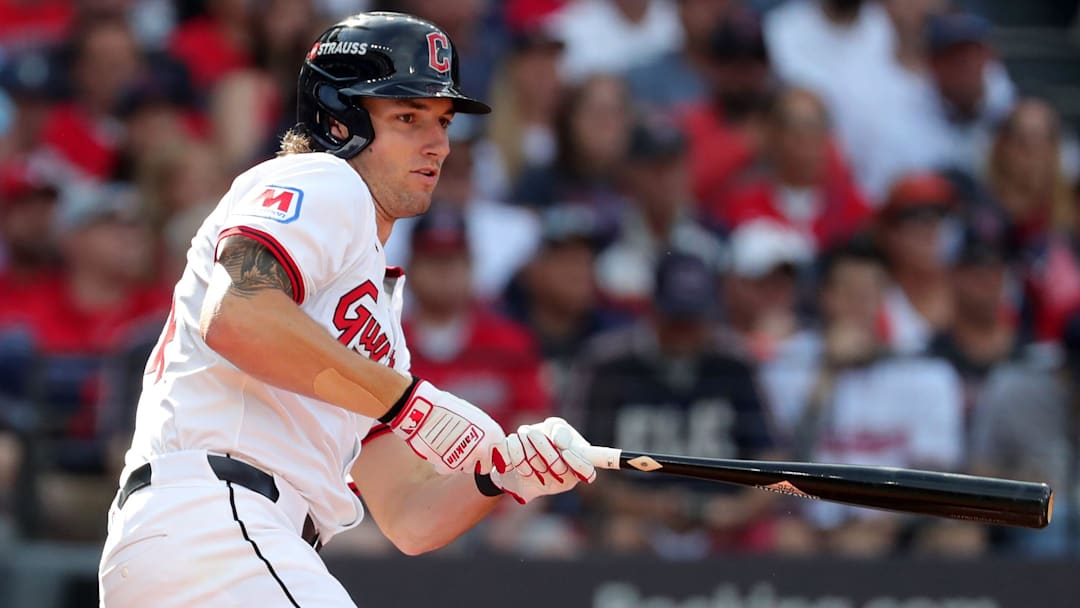 Cleveland Guardians center fielder Chase DeLauter (34) watches his first career hit during the second inning of Game 3 of the American League Wild Card Series at Progressive Field, Oct. 2, 2025, in Cleveland, Ohio.