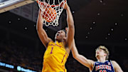 Iowa State Cyclones center Dishon Jackson (1) dunks the ball over Arizona Wildcats forward Henri Veesaar (13) during the first half in the Big 12 men’s basketball showdown at Hilton Coliseum on Saturday March 1, 2025 in Ames, Iowa.