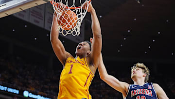 Iowa State Cyclones center Dishon Jackson (1) dunks the ball over Arizona Wildcats forward Henri Veesaar (13) during the first half in the Big 12 men’s basketball showdown at Hilton Coliseum on Saturday March 1, 2025 in Ames, Iowa.