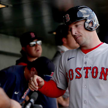 Sep 10, 2025; West Sacramento, California, USA; Boston Red Sox third baseman Alex Bregman (2) is congratulated by teammates after scoring a run against the Athletics during the third inning at Sutter Health Park. Mandatory Credit: Dennis Lee-Imagn Images