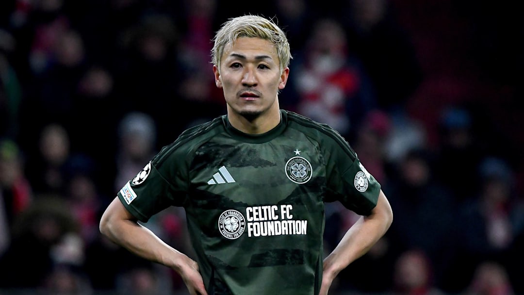 Celtic forward Daizen Maeda stands on the pitch during UCL second leg knock-out playoff match against Bayern Munich. 