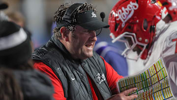 Head Coach Jason Eck of the New Mexico Lobos talks to his team during the second half against the Boise State Broncos at Albertsons Stadium on October 11, 2025 in Boise, Idaho. Boise State won the game 41-25.