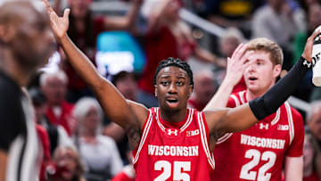 Wisconsin Badgers guard John Blackwell (25) and Wisconsin Badgers forward Steven Crowl (22) react to a call Saturday, March 15, 2025, in a semifinals game at the 2025 TIAA Big Ten Men’s Basketball Tournament between the Michigan State Spartans and the Wisconsin Badgers at Gainbridge Fieldhouse in Indianapolis.