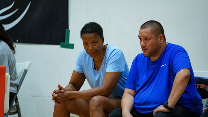 Xavier College Preparatory girls basketball head coach, Jennifer Gillom (left) watches her team play in the Monarch Sports Lady Extravaganza Tournament at Westwood High School on June 3, 2023 in Mesa, AZ.