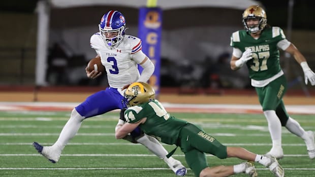 St. Bonaventure's Dylan Dunst tackles Folsom quarterback Ryder Lyons during the fourth quarter of the CIF-State Division 1-A 