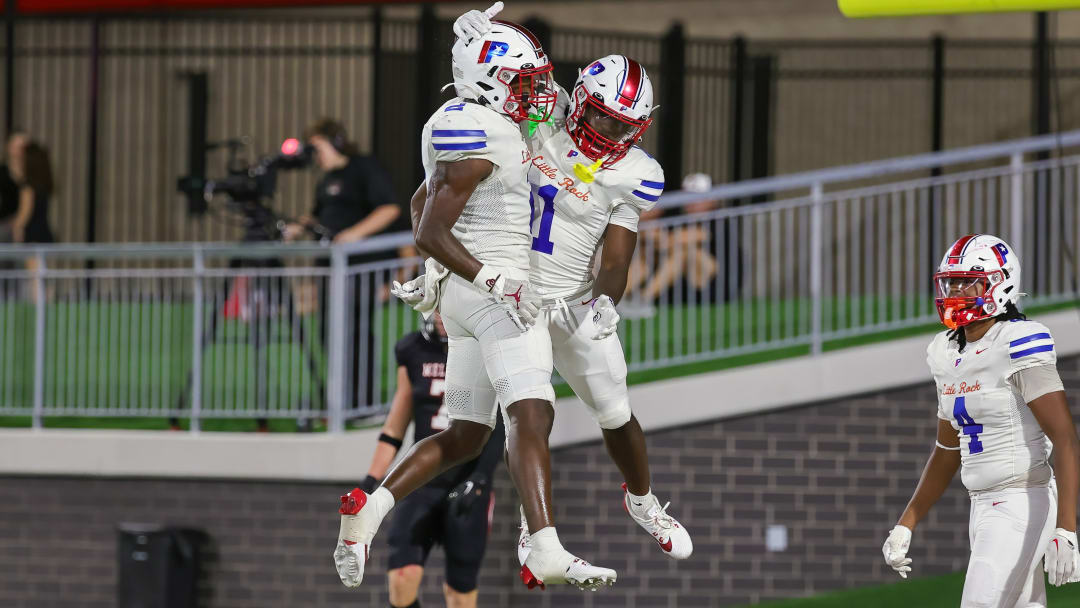 Monterrio Elston (right) of Parkview celebrates with a teammate following a touchdown. 