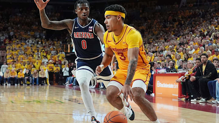 Iowa State Cyclones guard Tamin Lipsey (3) drives with the ball around Arizona Wildcats guard Jaden Bradley (0) during the first half in the Big-12 men’s basketball showdown at Hilton Coliseum on Saturday March 1, 2025 in Ames, Iowa. Iowa State Cyclones guard Tamin Lipsey (3) drives with the ball around Arizona Wildcats guard Jaden Bradley (0) during the first half in the Big-12 men’s basketball showdown at Hilton Coliseum on Saturday March 1, 2025 in Ames, Iowa.