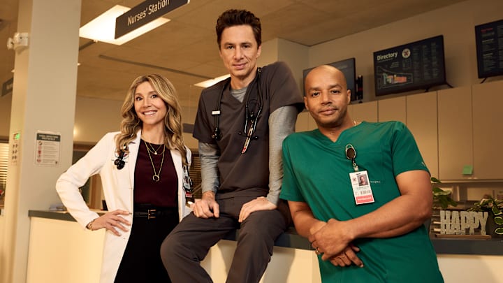 SCRUBS - ABC's “Scrubs” stars Sarah Chalke as Elliot Reid, Zach Braff as John "J.D." Dorian, and Donald Faison as Christopher Turk. 