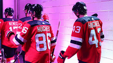 Oct 2, 2023; Newark, New Jersey, USA; New Jersey Devils center Jack Hughes (86) and defenseman Luke Hughes (43) walk to the ice before the start of the first period of their game against the New York Islanders at Prudential Center. Mandatory Credit: Ed Mulholland-Imagn Images