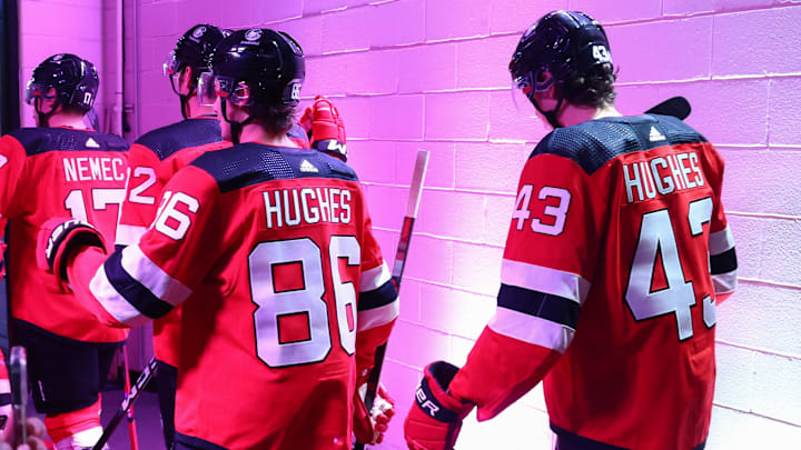 Oct 2, 2023; Newark, New Jersey, USA; New Jersey Devils center Jack Hughes (86) and defenseman Luke Hughes (43) walk to the ice before the start of the first period of their game against the New York Islanders at Prudential Center. Mandatory Credit: Ed Mulholland-Imagn Images