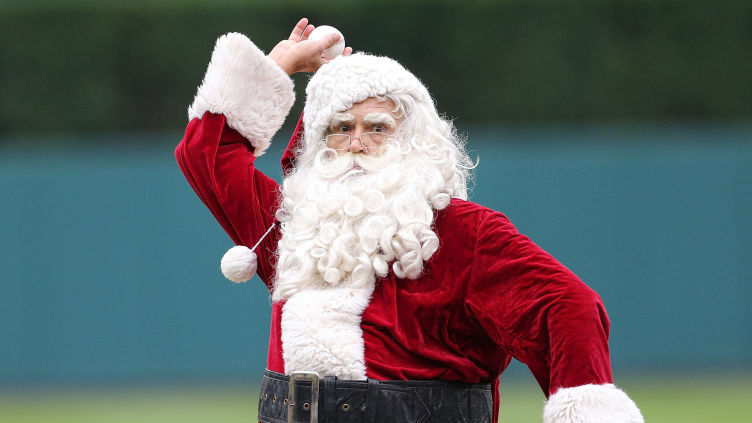 Santa Claus throws out the first pitch.