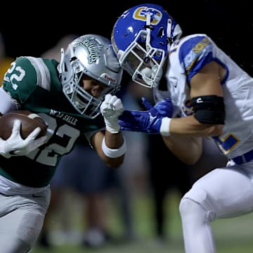 At 5-foot-7, 165 pounds, De La Sallee senior Derek Blanche Jr. (22) doesn't back down from anyone. He rushed for 182 yards on 12 carries and a touchdown in Friday's 39-10 win over Serra at Owen Owens Field on Sept. 6, 2024. 