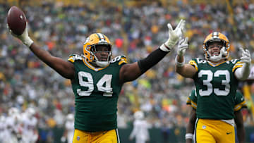 Green Bay Packers defensive end Karl Brooks (94), along with safety Evan Williams (33), celebrates after recovering a fumble against the Arizona Cardinals on Sunday, October 13, 2024 at Lambeau Field in Green Bay, Wis. The Packers defeated the Cardinals 34-13.
Wm. Glasheen USA TODAY NETWORK-Wisconsin