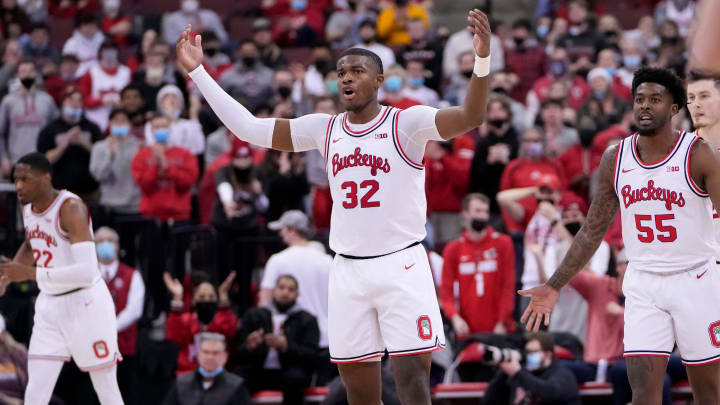 Ohio State Buckeyes forward E.J. Liddell (32) tries to pump up the crowd during the second half of the NCAA men's basketball game against the Minnesota Golden Gophers at Value City Arena in Columbus on Tuesday, Feb. 15, 2022. Ohio State won 70-45.

PHOTO 1: Minnesota Golden Gophers At Ohio State Buckeyes Men S Basketball