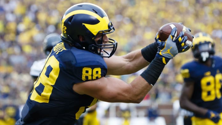 Sep 10, 2016; Ann Arbor, MI, USA; Michigan Wolverines tight end Jake Butt (88) makes a reception for a touchdown in the second quarter against the UCF Knights at Michigan Stadium. Mandatory Credit: Rick Osentoski-USA TODAY Sports