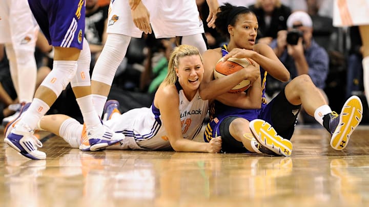 Sep 21, 2013; Phoenix, AZ, USA; Los Angeles Sparks guard Marissa Coleman (25) and Phoenix Mercury forward Penny Taylor (13) battle for the ball in the second half during Game 2 of a WNBA basketball Western Conference semifinal series at US Airways Center. The Sparks defeated the Mercury 82-73. Mandatory Credit: Jennifer Stewart-Imagn Images
Sep 21, 2013; Phoenix, AZ, USA; Los Angeles Sparks guard Marissa Coleman (25) and Phoenix Mercury forward Penny Taylor (13) battle for the ball in the second half during Game 2 of a WNBA basketball Western Conference semifinal series at US Airways Center. The Sparks defeated the Mercury 82-73. Mandatory Credit: Jennifer Stewart-Imagn Images