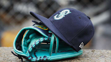 May 12, 2018; Detroit, MI, USA; Hat and glove of Seattle Mariners center fielder Dee Gordon (9) sits in dugout during the third inning against the Detroit Tigers at Comerica Park. Mandatory Credit: Rick Osentoski-Imagn Images