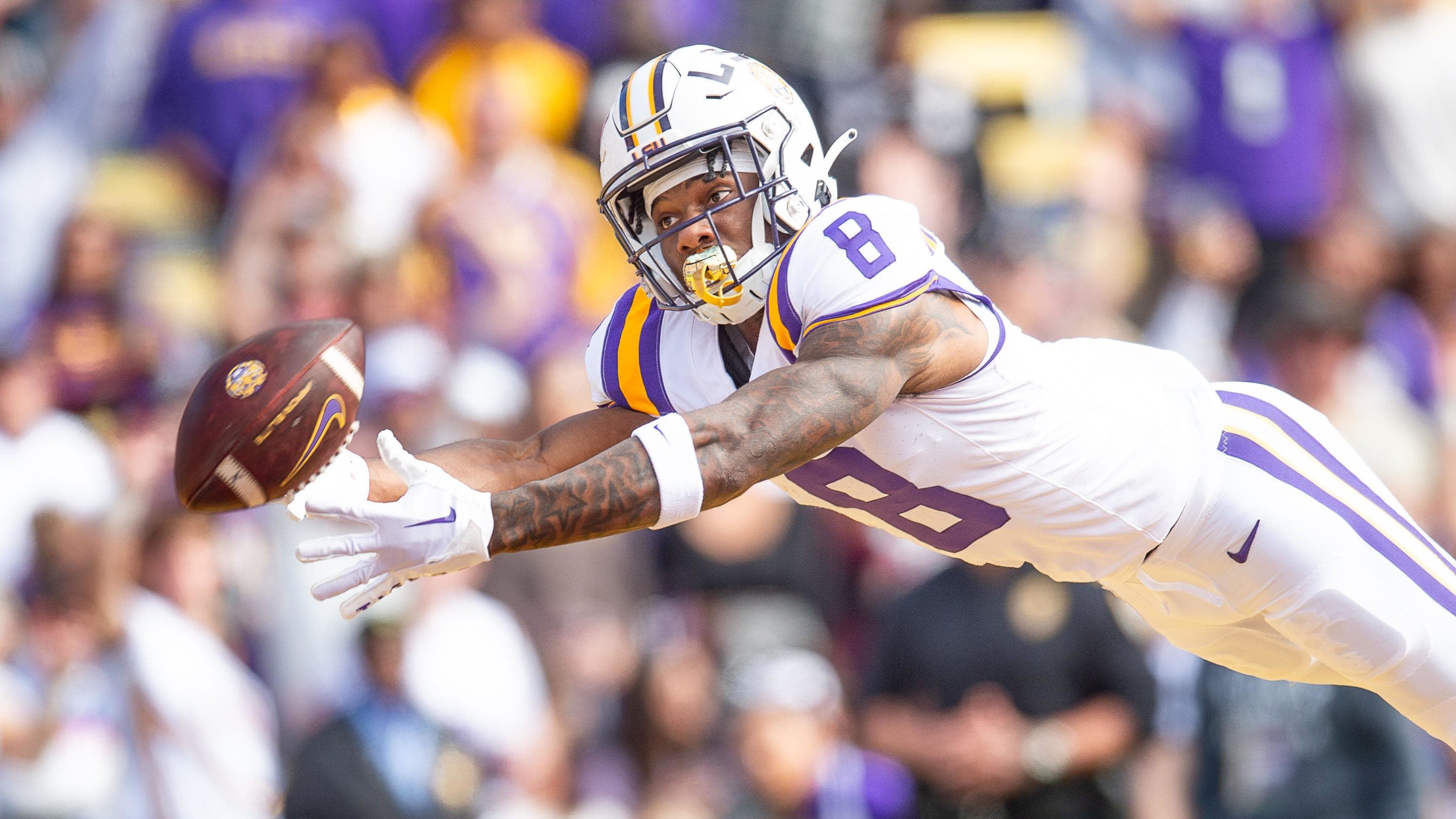 Malik Nabers dives for a ball as the LSU Tigers take on the Texas A&M Aggies.
