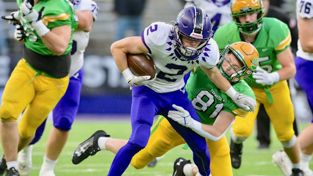 Anacortes wide receiver Brady Beaner pulls away from a defender in WIAA Class 2A championship game.
