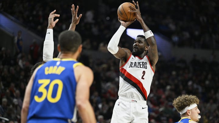 Apr 11, 2024; Portland, Oregon, USA; Portland Trail Blazers center Deandre Ayton (2) shoots a jump shot during the second half against the Golden State Warriors at Moda Center. Mandatory Credit: Troy Wayrynen-USA TODAY Sports