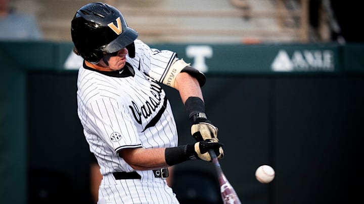 Vanderbilt's Brodie Johnston (9) swings at a pitch during a college baseball game between Tennessee and Vanderbilt at Lindsey Nelson Stadium in Knoxville, Tenn., on May 9, 2025.