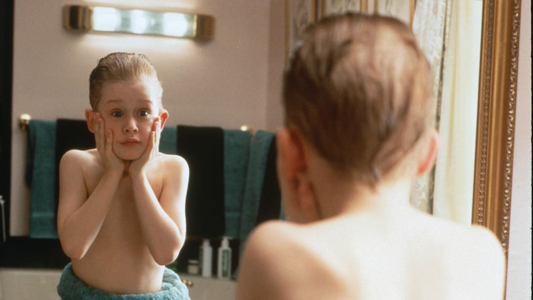 HOME ALONE - Eight year old Kevin MacAllister (Macaulay Culkin) gets lost in the shuffle as his large, upper-middle class suburban family rushes to make a plane that will ferry them off to their Christmas vacation in France; Kevin, having been banished to an attic room as punishment, is subsequently forgotten. At first this is a dream come true, as for the first time in his young life he has no one to answer to but himself, and he takes full advantage of his newfound freedom, eating junk food