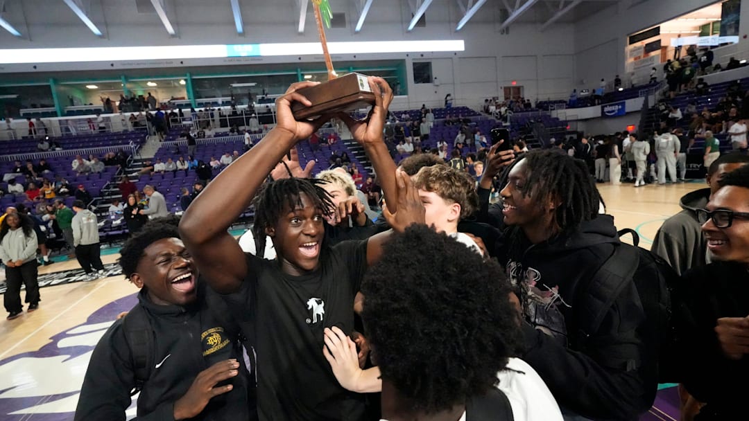 Abdou Toure won first place in the dunk contest. Basketball players competed in the Edison National Bank Slam Dunk Championship Sunday Dec. 21, 2025, at Suncoast Credit Union Arena in Fort Myers. This is one of the events in the GEICO City of Palms Classic basketball tournament. Abdou Toure won first place in the dunk contest. Basketball players competed in the Edison National Bank Slam Dunk Championship Sunday Dec. 21, 2025, at Suncoast Credit Union Arena in Fort Myers. This is one of the events in the GEICO City of Palms Classic basketball tournament.