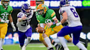 Brock Beaner, left, and Tyler Olson close in on a tackle during Anacortes' 60-30 win over Tumwater to win WIAA Class 2A title in 2023.