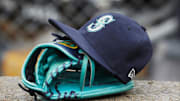 May 12, 2018; Detroit, MI, USA; Hat and glove of Seattle Mariners center fielder Dee Gordon (9) sits in dugout during the third inning against the Detroit Tigers at Comerica Park. Mandatory Credit: Rick Osentoski-Imagn Images