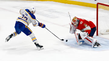 Jack Quinn (22) with a shot on a breakaway against Panthers Vitek Vanecek (41)
