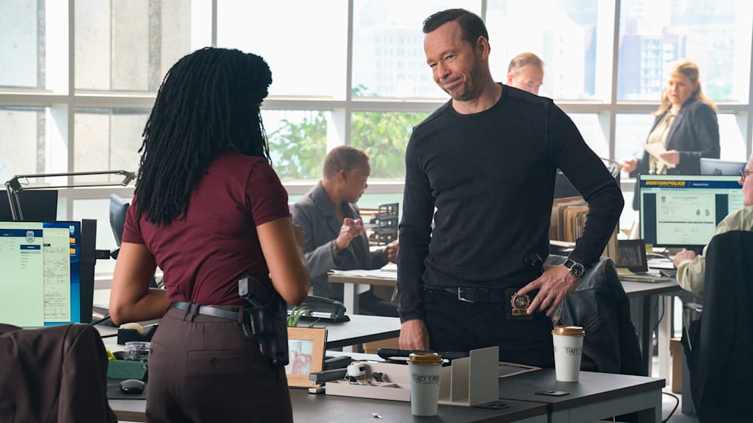 Pictured: Donnie Wahlberg as Danny Reagan and Sonequa Martin-Green as Lena Silver in Boston Blue season 1 Pictured: Donnie Wahlberg as Danny Reagan and Sonequa Martin-Green as Lena Silver in Boston Blue season 1