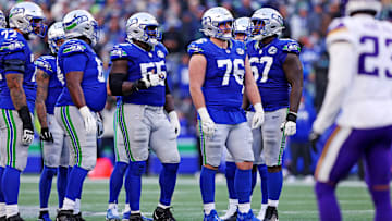 Nov 30, 2025; Seattle, Washington, USA; Seattle Seahawks guard Grey Zabel (76) reacts after an interception during the second half against the Minnesota Vikings at Lumen Field.