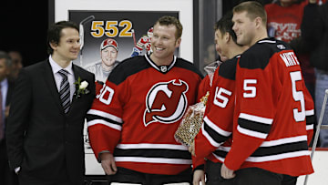 New Jersey Devils goalie Martin Brodeur (30) is honored for setting the NHL all-time wins record. Mandatory Credit: Ed Mulholland-Imagn Images