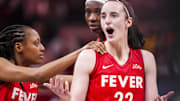 May 17, 2025; Indianapolis, IN, USA;  Indiana Fever guard Caitlin Clark (22) reacts to receiving a flagrant foul Saturday, May 17, 2025, during a game between the Indiana Fever and the Chicago Sky at Gainbridge Fieldhouse in Indianapolis. The Indiana Fever defeated the Chicago Sky, 93-58.Mandatory Credit: Grace Smith-IndyStar via Imagn Images