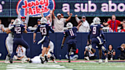 Nov 22, 2025; Tucson, Arizona, USA; Arizona Wildcats linebacker Jabari Mann (11) intercepts and runs a touchdown during the fourth quarter of the game against the Baylor Bears at Casino Del Sol Stadium. Mandatory Credit: Aryanna Frank-Imagn Images