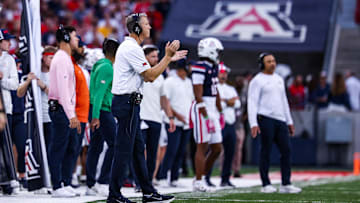 Oct 11, 2025; Tucson, Arizona, USA; Arizona Wildcats head coach Brent Brennan claps on the sidelines during the first quarter of the game against the Brigham Young Cougars at Arizona Stadium. Mandatory Credit: Aryanna Frank-Imagn Images