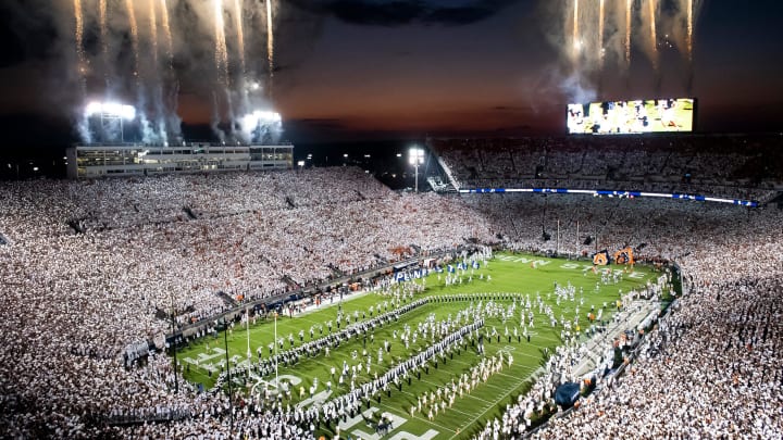 The Penn State football team runs out onto the field to take on Auburn in a White Out game at Beaver Stadium.