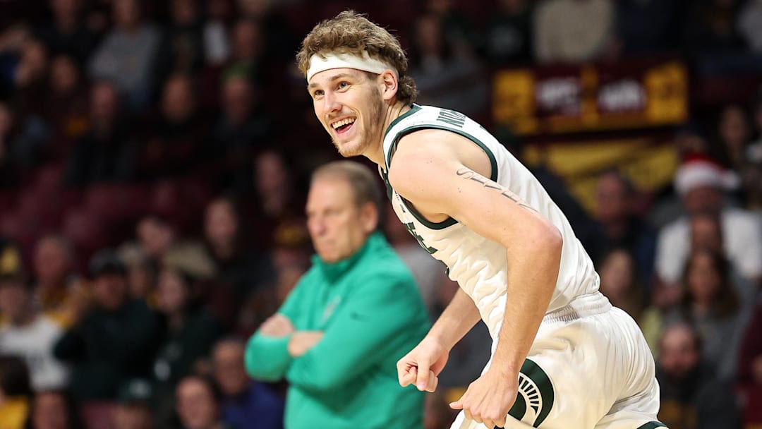 Dec 4, 2024; Minneapolis, Minnesota, USA; Michigan State Spartans guard Gehrig Normand (7) celebrates his three-point basket against the Minnesota Golden Gophers during the second half at Williams Arena. Mandatory Credit: Matt Krohn-Imagn Images