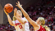 Indiana's Karoline Striplin (11) shoots over Nebraska's Alexis Markowski (40) during the Indiana versus Nebraska women's basketball game at Simon Skjodt Assembly Hall on Sunday, Feb. 2, 2025.